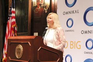 Honorary Chair, Carmen Castillo, President & CEO at SDI International Corp kicking off OMNIKAL 17th Annual National Business Summit.